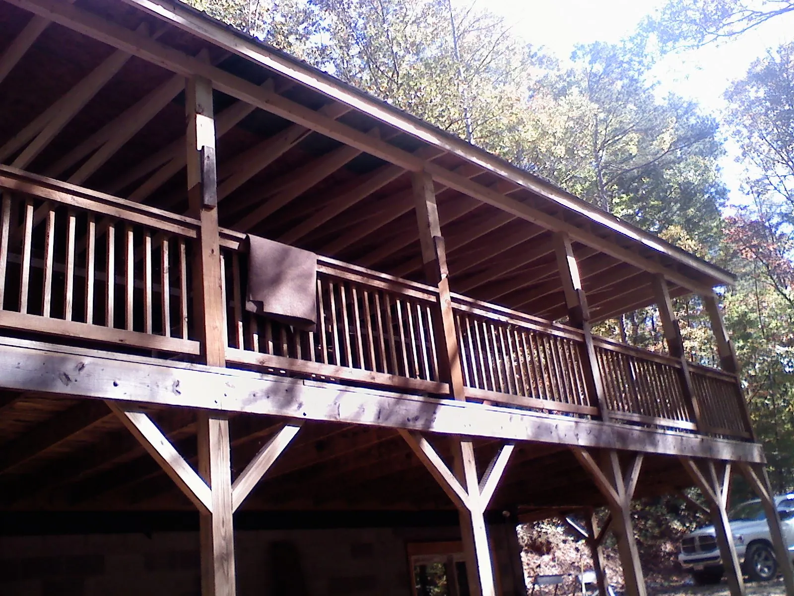 Timber framing under a new elevated porch and deck — Roof Leak Repair in Acme by Roofing Brothers
